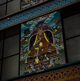 A colorful religious artwork on a building
