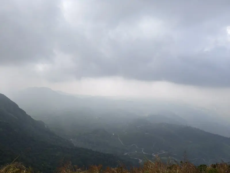 Cloud and mist drifting across mountain ridges